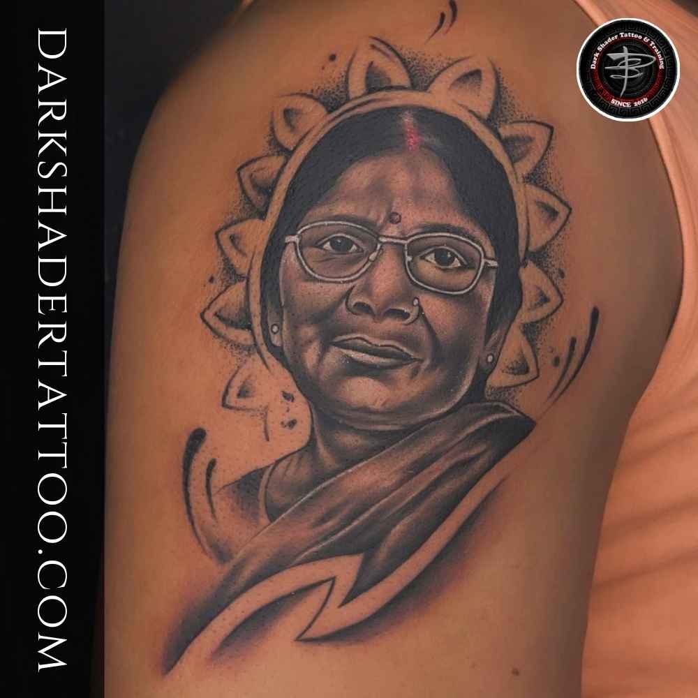 A beautiful family connection tattoo on a woman’s shoulder, symbolizing a memory of her mother with emotional design elements.