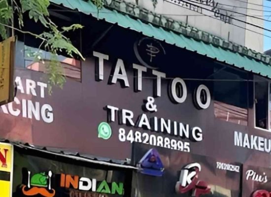 Dark shader tattoo & training board showing branding, logo and whatsapp number