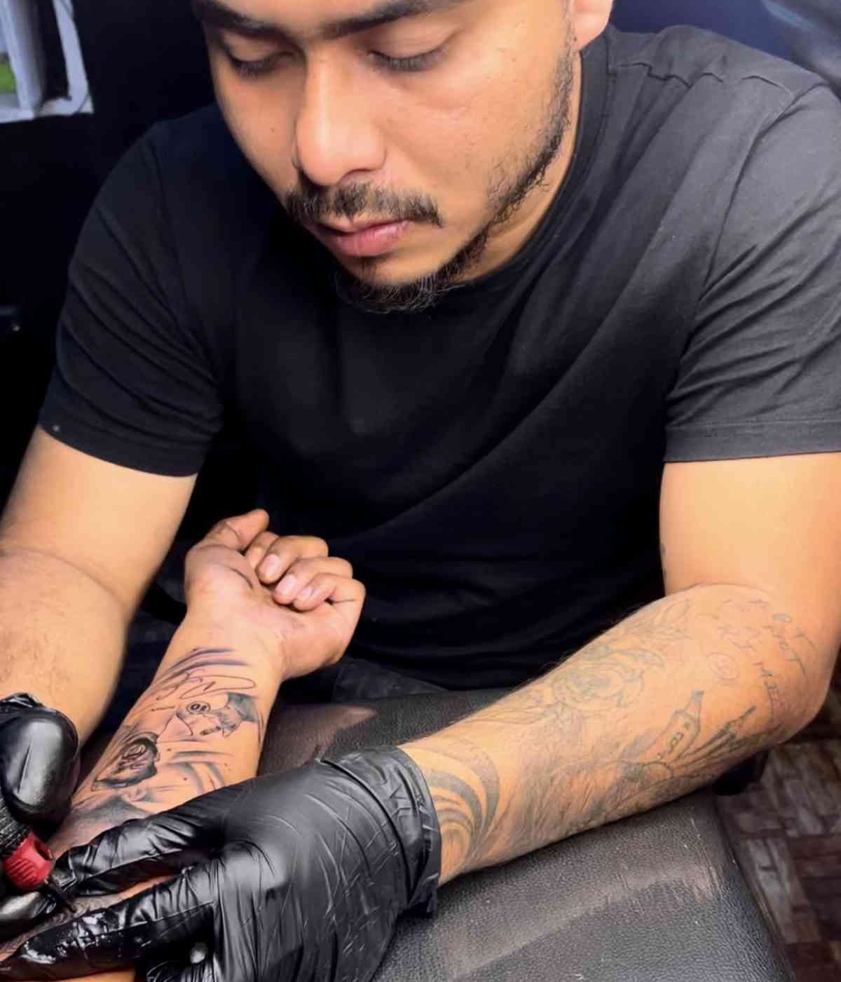 Tattoo artist Souvik Das focused on creating a tattoo with maintaining a clean and hygienic environment at Dark Shader Tattoo shop in Kolkata.